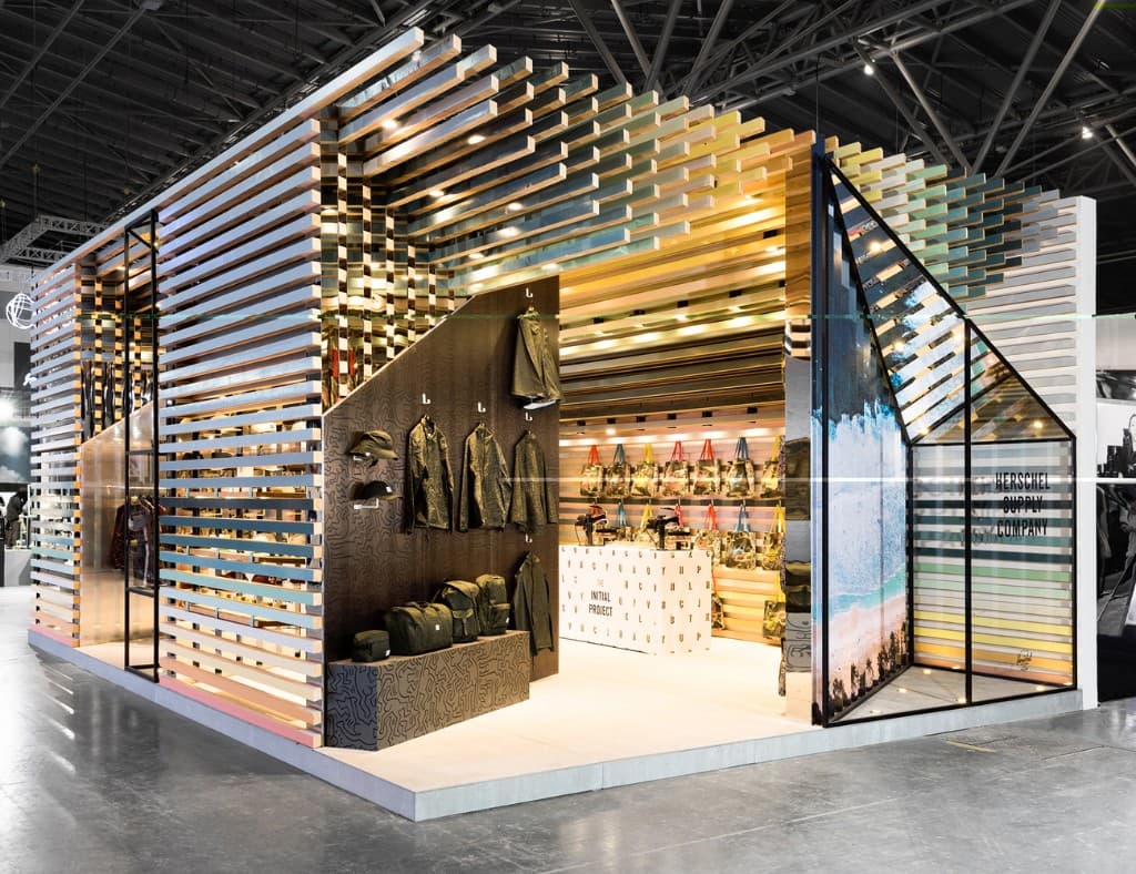 Temporary retail pop-up with slatted facade, product display, and immersive interior